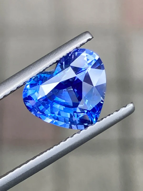 3.02ct heart shaped natural blue sapphire viewed from an angle