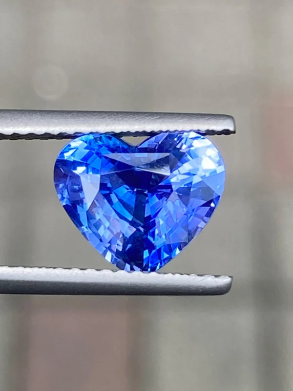 3.02ct natural blue sapphire heart showing brilliant step cut