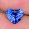 3.02ct natural blue sapphire heart shown for size reference