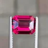 Natural rhodolite garnet emerald shape front view Natural rhodolite garnet mixed cut side view